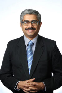 Dr. Mohan Menon
