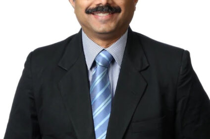 Dr. Mohan Menon