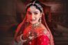 Professional bridal makeup artist in Durgapur creating a flawless wedding look for a bride
